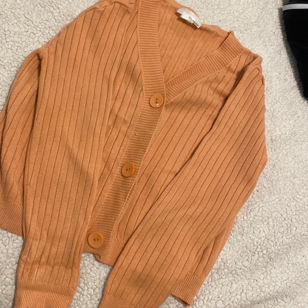 Peach colored cropped sweater